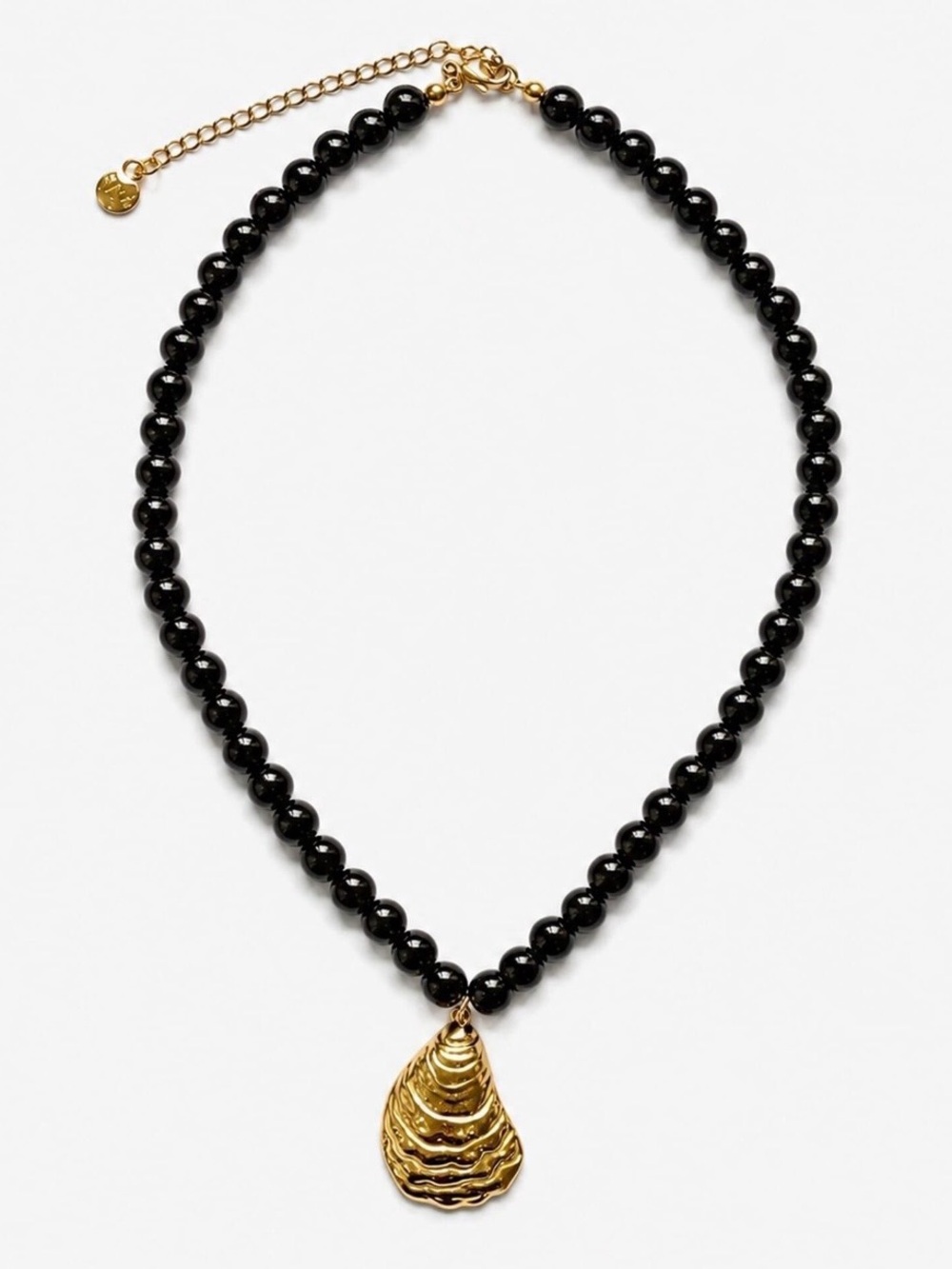 Gold Shell Pendant on Black Beaded Necklace